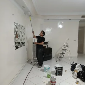 نقاش ساختمان در جی