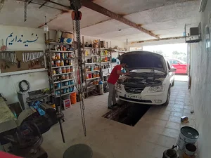 تعمیرگاه اتومبیل علی