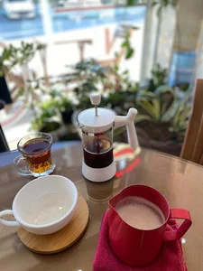 مرکز قهوه کرگدن تلخ (کافه رستری رویین)