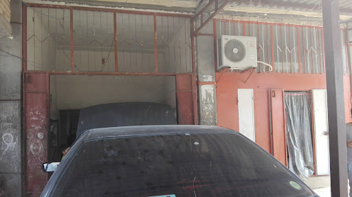 تعمیرگاه وجلوبندی سازی استاد حمزه