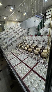 طلا و جواهری قانع