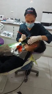 مطب دندانپزشکی دکتر الهام بابایی روچی اطفال، ارتودنسی، کامپوزیت ونیر ، بلیچینگ (سفید کردن دندان) عصب کشی، پرکردن، روکش 4