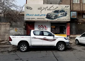 شبرنگ استیکر خط کشی انواع وانت تویوتا هایلوکس پرادوو لندکروزر نیسان پیکاپ و نیسان ریچ هنرکده حسین زاده 2