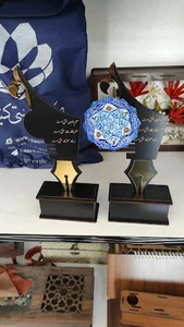 برش وحکاکی وتابلوسازی نقش و نگار