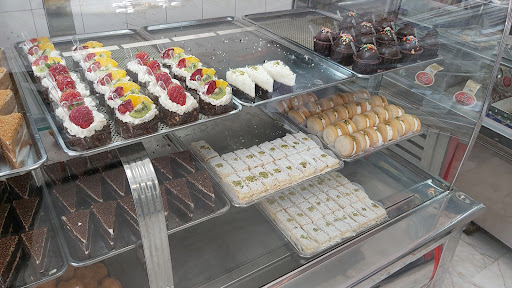 شیرینی و بستنی طالب