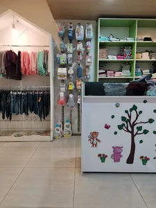 لباس نوزاد و کودک قاصدک
