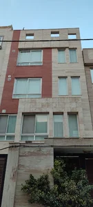 ساختمان تک