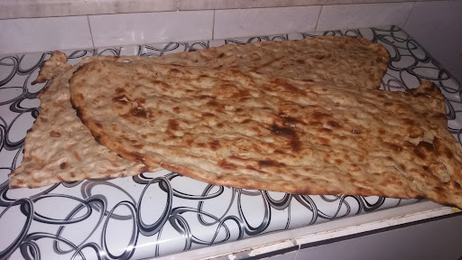 نانوایی سنگک سنتی شاطر تقی