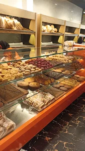 شیرینی و نان حجیم سردار جنگل