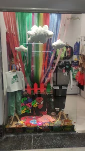 لباس کودک رنگین کمون
