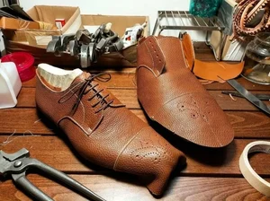 تعمیرات کفش و کیف علیزاده