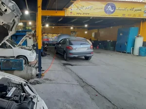 اژدم گاراژ تعمیرگاه تعویض روغنی و سرویس های دوره ایی خودرو 5