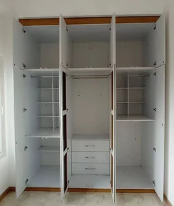 طراحی و ساخت انواع کابینت، کمد دیواری، درب...