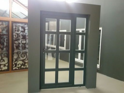 کارگاه تولید درب و پنجره upvc و آلومینیوم باقری