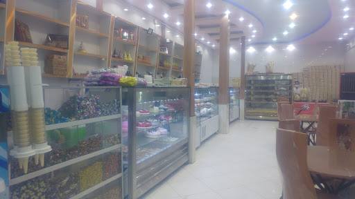 شیرینی سرای بزرگ کریمی( گروه صنعتی خواهان)( تولید کیک وکلوچه)