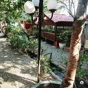 باغچه رستوران و کافی شاپ نان و نمک شهران 5