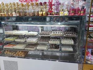 شیرینی تندیس