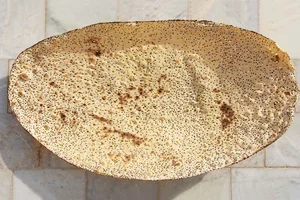 یک نانوا (نان سنتی کمشچه)
