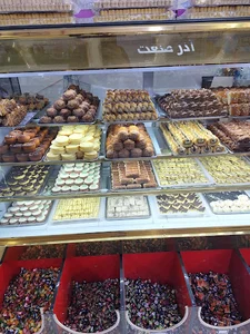 شیرینی و بستنی سنتی رضایت