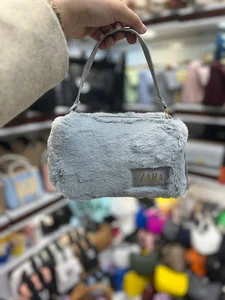 بوتیک و اکسسوری مانلی