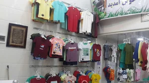 فروشگاه پوشاک کودک و نوجوان مامان جون